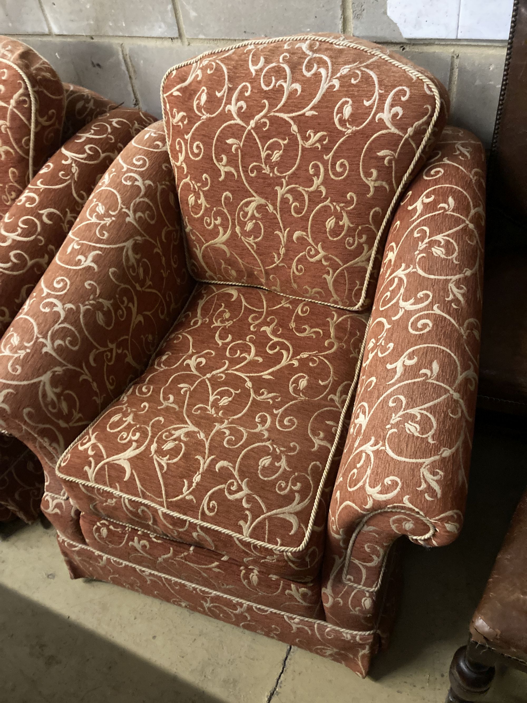A pair of contemporary upholstered armchairs, width 96cm depth 100cm height 96cm